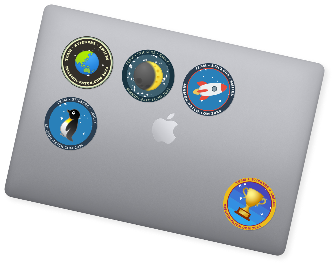 Laptop with example Mission Patch stickers on the cover
